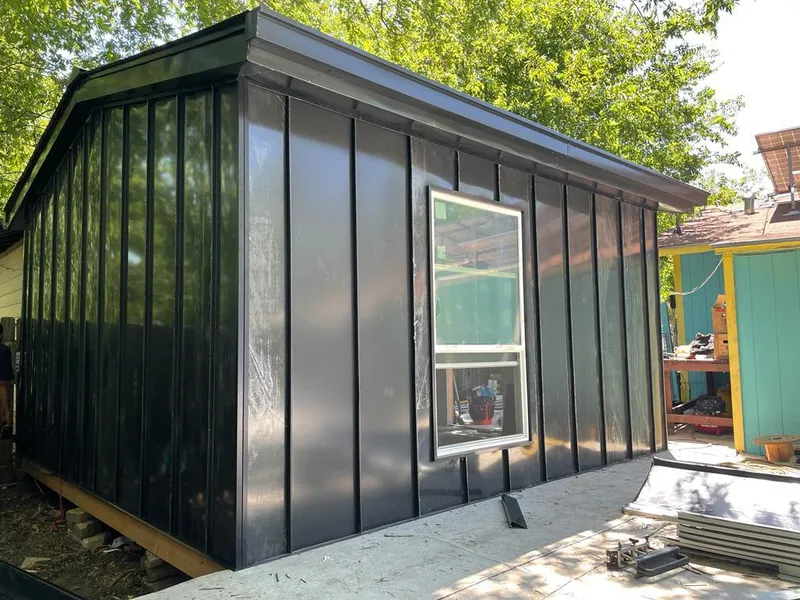 Black standing seam metal wall panels for Metal Roof Installation in Wood River