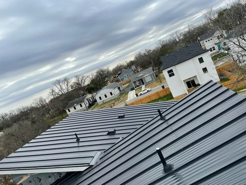 Standing seam metal roof panels with vents for Skylight Repair in Wood River